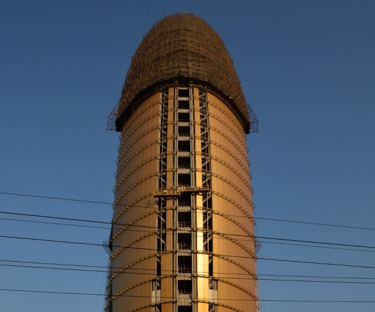 Beijing residents poked fun at The People's Daily Headquarters in Beijing while it was under construction. A doctored photo of the phallic building, superimposed under the CCTV 'pants' building, went viral on the Internet before censors removed the images.