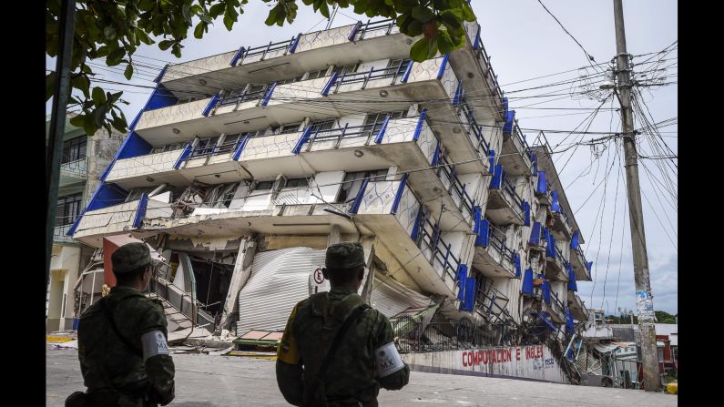 Soldiers stand guard Friday, September 8, near the Sensacion hotel, which collapsed in Matias Romero, Mexico, after <a href="http://www.cnn.com/2017/09/08/americas/gallery/mexico-earthquake-2017/index.html" target="_blank">a magnitude-8.1 earthquake</a> struck the country's southern coast. It was the strongest quake to hit the country in 100 years, according to President Enrique Peña Nieto.