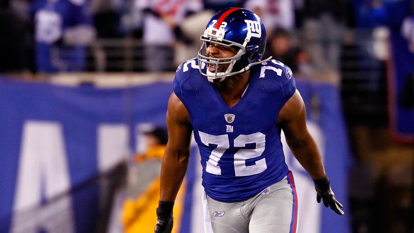EAST RUTHERFORD, NJ - JANUARY 01: Osi Umenyiora #72 of the New York Giants reacts after a tackle against the Dallas Cowboys at MetLife Stadium on January 1, 2012 in East Rutherford, New Jersey. (Photo by Jeff Zelevansky/Getty Images)