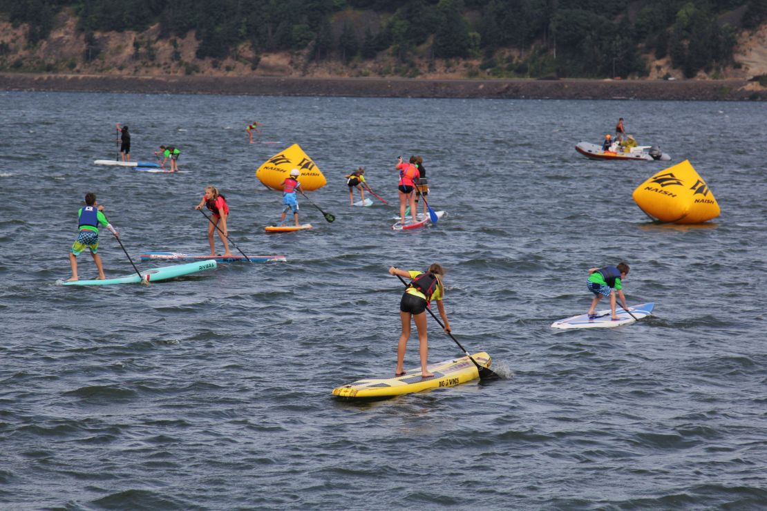 Being competative in a SUP course race around  buoys requires speed, stamina and agility.
