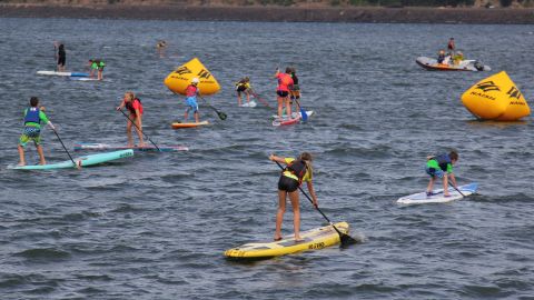 Being competative in a SUP course race around buoys requires speed, stamina and agility.
