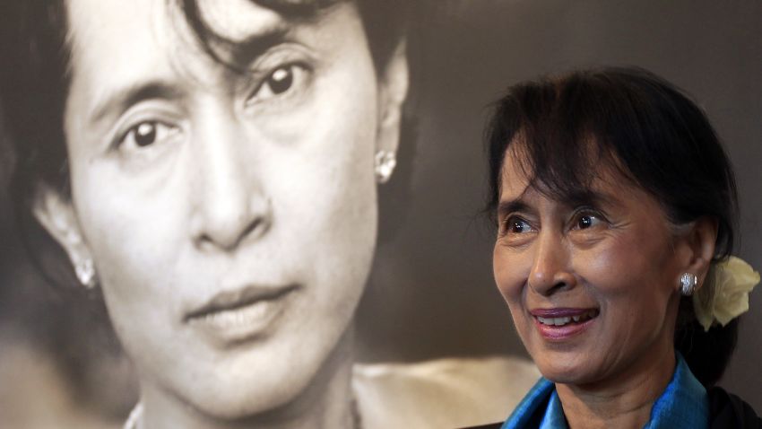 Myanmar democracy icon Aung San Suu Kyi tours the Nobel Peace center in Oslo on June 16, 2012. Suu Kyi on June 16 pledged to keep up her struggle for democracy as she finally delivered her Nobel Peace Prize speech, 21 years after winning the award while under house arrest. AFP PHOTO / POOL /Cathal McNaughton (Photo credit should read Cathal McNaughton/AFP/GettyImages)