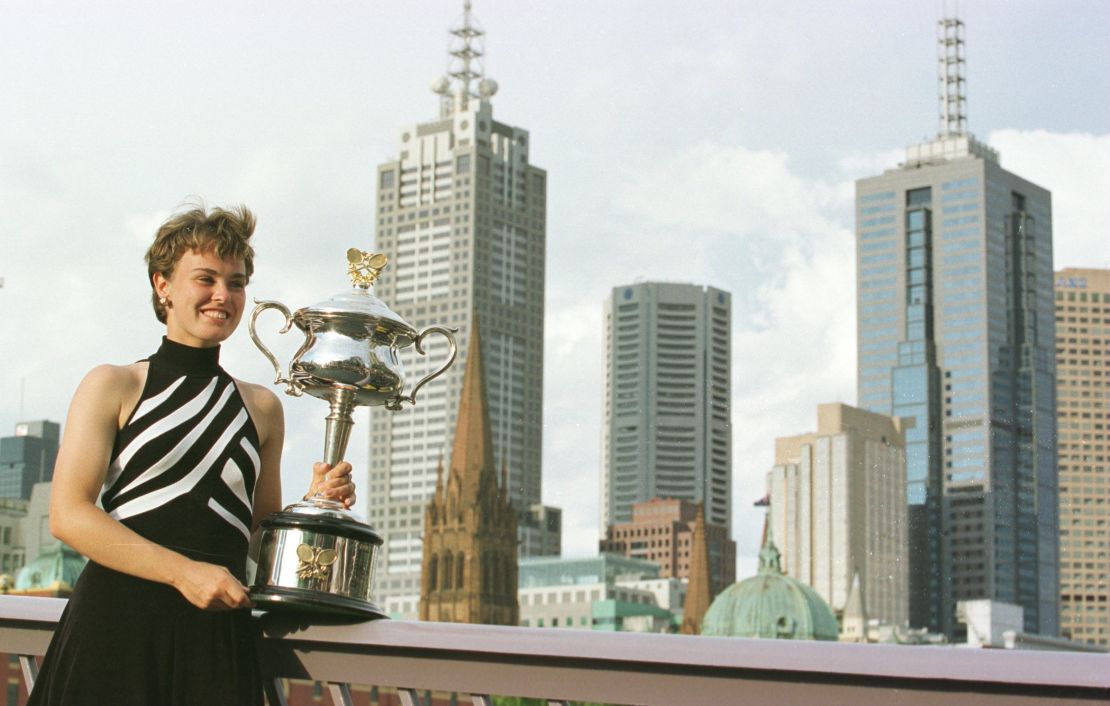 Martina Hingis, 16, poses with the 1997 Australian Open trophy. 