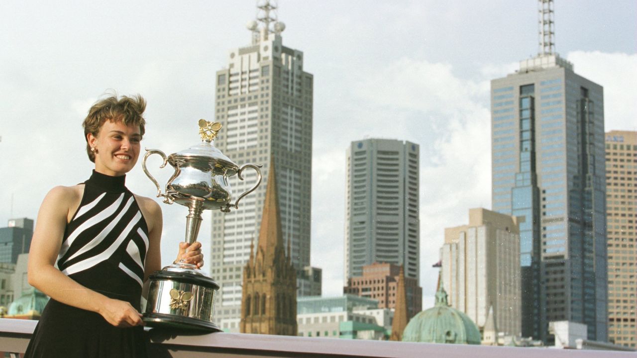 Martina Hingis, 16, poses with the 1997 Australian Open trophy.