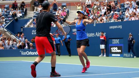 Martina Hingis celebrates winning the 2017 US Open mixed doubles with partner Jamie Murray. 