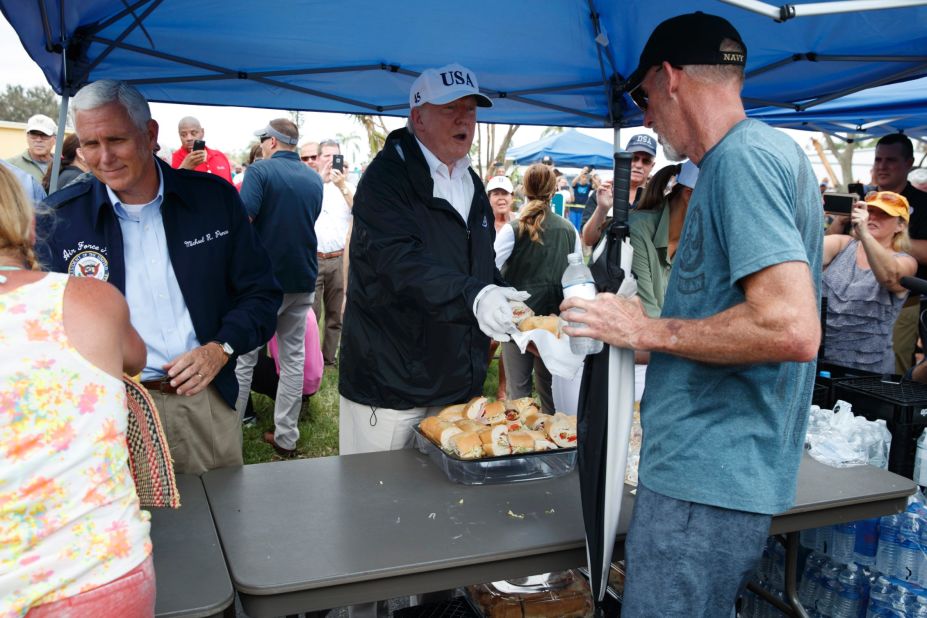 On September 14, President Donald Trump, Vice President Mike Pence and first lady Melania Trump hand out food to people impacted by Hurricane Irma in Naples, Florida. 