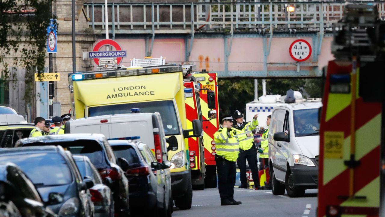 Ambulances and police stand nearby after an incident on a tube train at Parsons Green subway station.