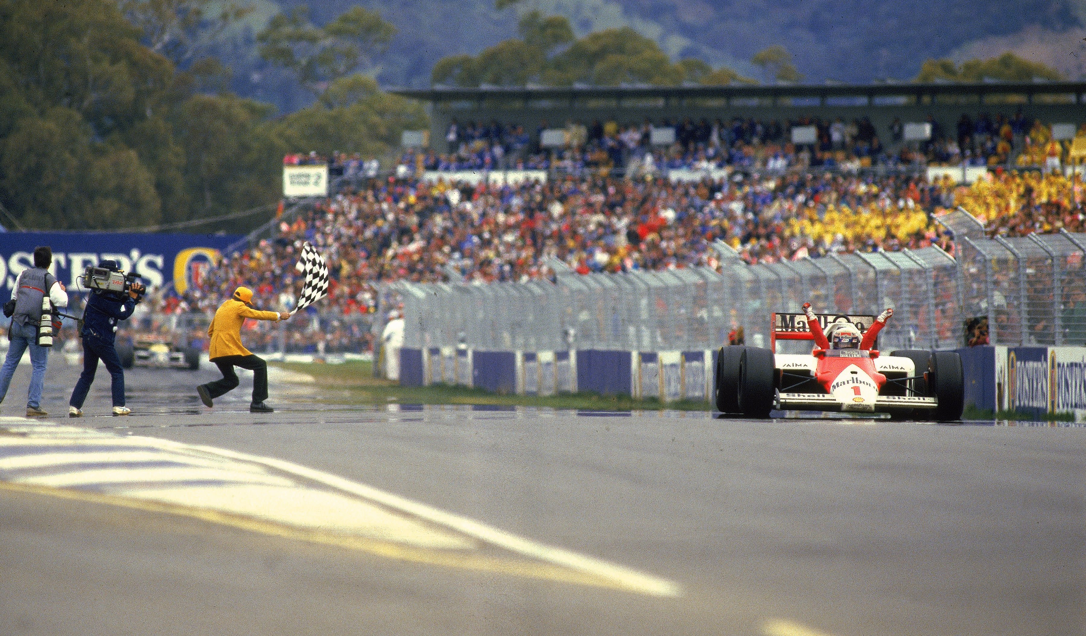 McLaren and Honda were hoping to rekindle former successes on the track. From 1988 to 1991, the pairing yielded four consecutive F1 constructors' titles. In this picture, France's Alain Prost celebrates taking the checkered flag at the 1988 Australian Grand Prix in Adelaide. 