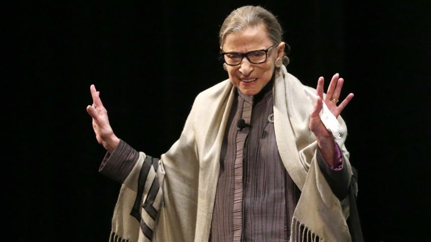 U.S. Supreme Court Justice Ruth Bader Ginsburg acknowledges the crowd's applause before participating in a conversation with Judge Ann Claire Williams of the U.S. Court of Appeals for the Seventh Circuit at Roosevelt University Monday, Sept. 11, 2017, in Chicago. (AP Photo/Charles Rex Arbogast)