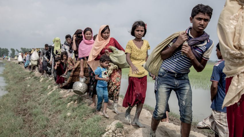 In Cox's Bazar, Bangladesh, tens of thousands of refugees flee over the border from Burma.
