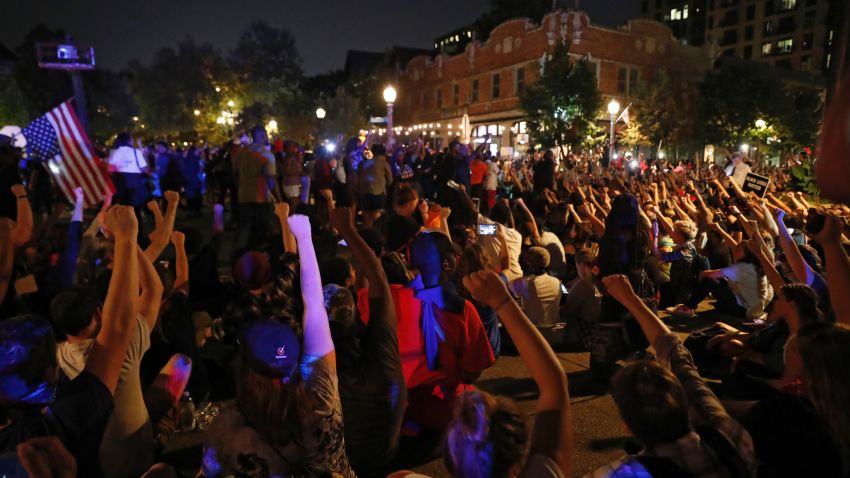 Protesters gather, Friday, Sept. 15, 2017, in St. Louis, after a judge found a white former St. Louis police officer, Jason Stockley, not guilty of first-degree murder in the death of a black man, Anthony Lamar Smith, who was fatally shot following a high-speed chase in 2011. (AP Photo/Jeff Roberson)