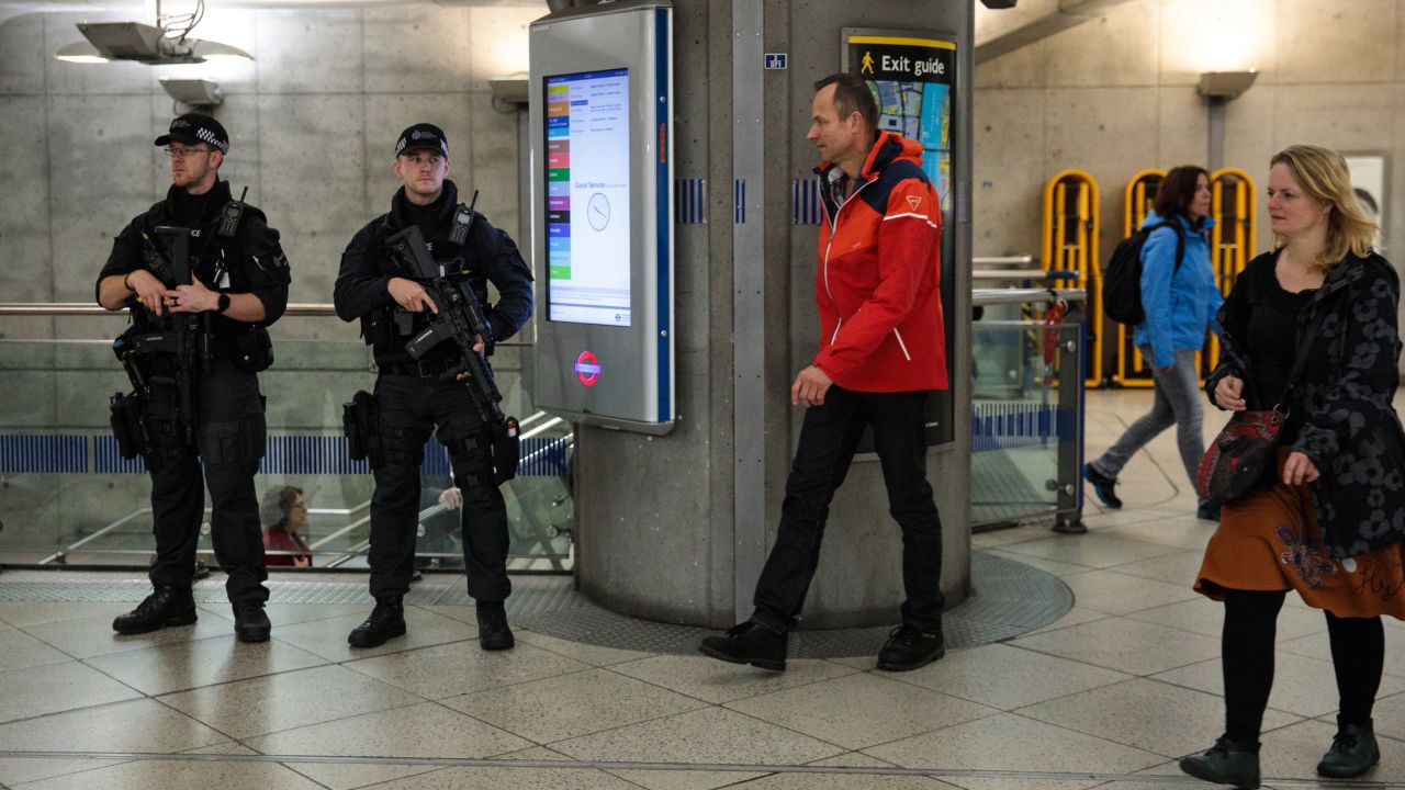Armed police patrol in Westminster Underground station on Saturday. 