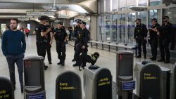 LONDON, ENGLAND - SEPTEMBER 16: Police and armed police patrol in Westminster Underground station on September 16, 2017 in London, England. An 18-year-old man has been arrested in Dover in connection with yesterday's terror attack on Parsons Green station in which 30 people were injured. The UK terror threat level has been raised to 'critical'. (Photo by Jack Taylor/Getty Images)