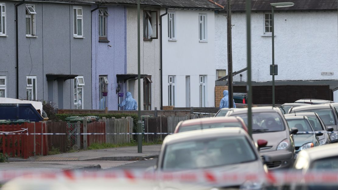 Forensic officers take part in an operation in Sunbury-on-Thames, Surrey, as part of the investigation into the Parsons Green bombing on Saturday.