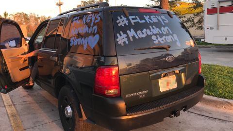 Elvira Vega's car near a checkpoint heading south into the Keys. Her brother sent her a photo of her destroyed home.