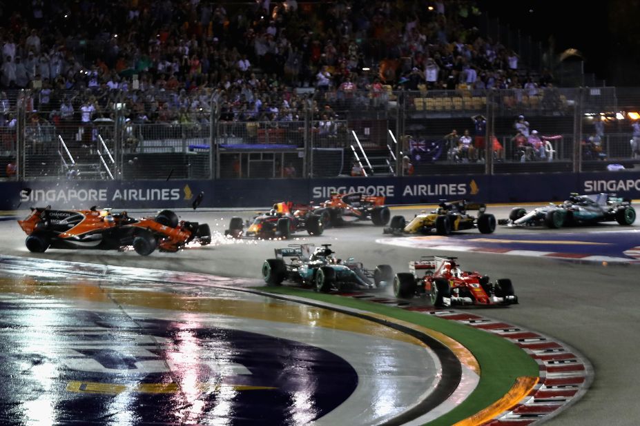 Vettel was also caught up in a chaotic start but managed to maintain the lead. Lewis Hamilton made up four places to second off the start before assuming the lead as Vettel spun out of the race at Turn Five. 