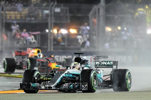 Lewis Hamilton took a three-point lead over Vettel into the Singapore GP.  