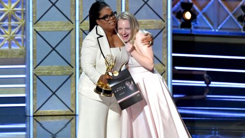 Oprah Winfrey  presents the outstanding lead actress in a drama series award for 'The Handmaid's Tale' to actor Elisabeth Moss.