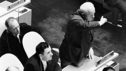 Soviet politician Nikita S. Khrushchev rises to his feet during a speech by British prime minister Harold Macmillan during the 15th session of the UN General Assembly at New York, September 9, 1960.  