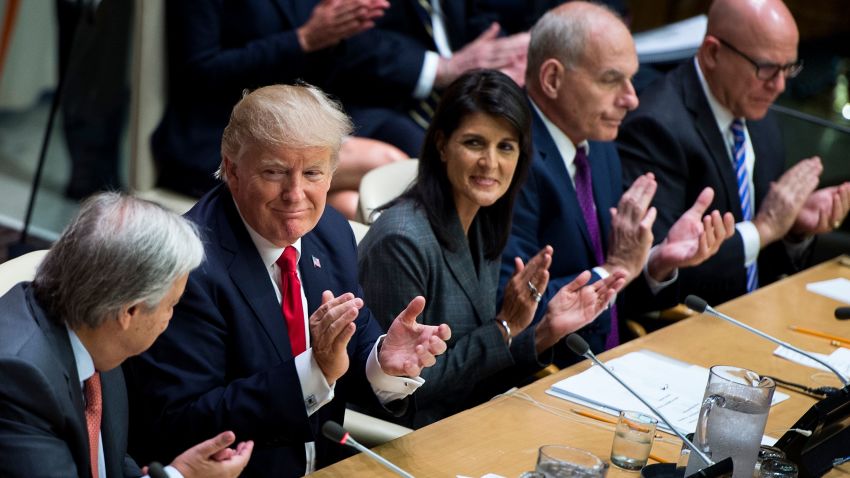 US President Donald Trump (2L), US Ambassador to the UN Nikki Haley (C), White House Chief of Staff John Kelly (2R) and National Security Advisor H. R. McMaster (R) clap for UN Secretary-General Antonio Guterres (L) a meeting on United Nations Reform at the UN headquarters in New York on September 18, 2017. (BRENDAN SMIALOWSKI/AFP/Getty Images)
