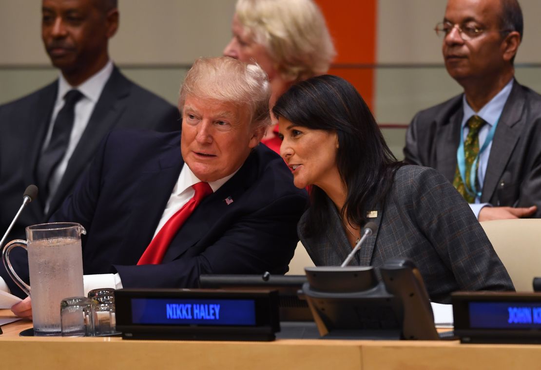 Trump and US Ambassador to the UN Nikki Haley speak during a meeting on UN reform on Monday.