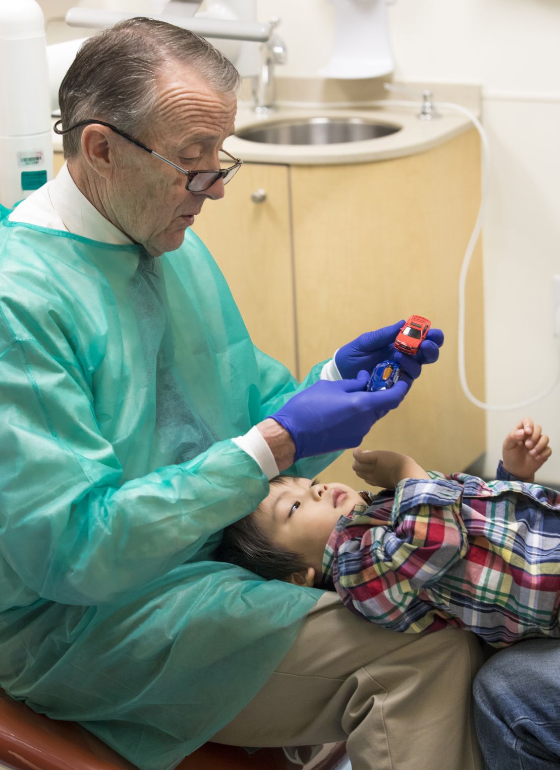 Communicating directly with children during dental exams can help reduce their stress, Ray Stewart says.