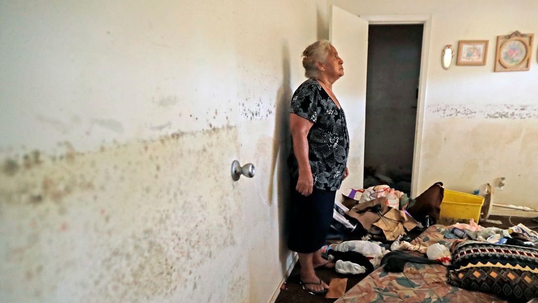 Florentina Amaya, 71, contemplates the mold growing inside her Houston home in the aftermath of Hurricane Harvey.