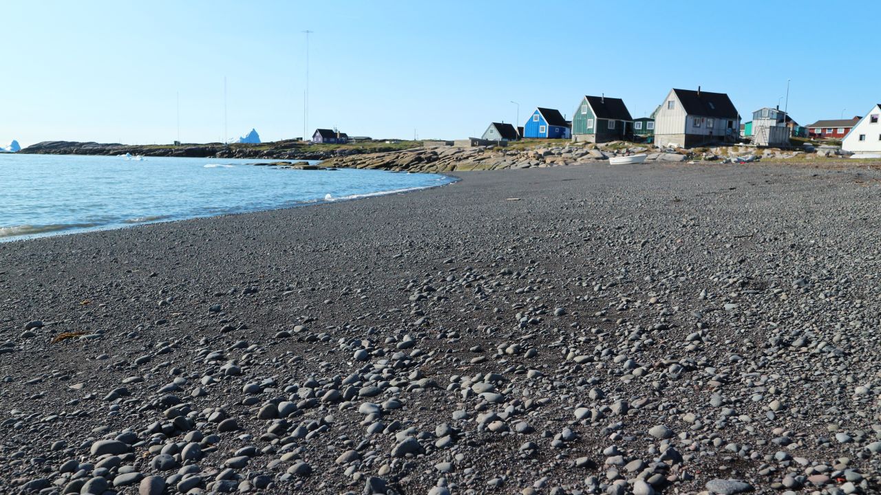 Whales are commonly spotted year round from this black beach on Disko Island.