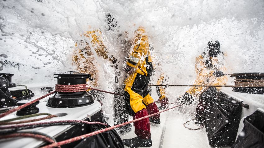 AT SEA - MARCH 24:  In this handout image provided by the Volvo Ocean Race, Leg 5 to Itajai onboard Abu Dhabi Ocean Racing. Louis Sinclair, Daryl Wislang, and Phil Harmer get the fire hydrant at eye level during a gybe in the Southern Ocean. The Volvo Ocean Race 2014-15 is the 12th running of this ocean marathon. Starting from Alicante in Spain on October 04, 2014, the route, spanning some 39,379 nautical miles, visits 11 ports in eleven countries (Spain, South Africa, United Arab Emirates, China, New Zealand, Brazil, United States, Portugal, France, The Netherlands and Sweden) over nine months. The Volvo Ocean Race is the world's premier ocean yacht race for professional racing crews. (Photo by Matt Knighton/Abu Dhabi Ocean Racing/Volvo Ocean Race via Getty Images)