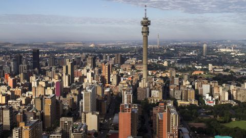 The Hillbrow Telkom tower stands amongst commercial and residential property on the city skyline in this aerial view of Johannesburg, South Africa, on Saturday, Dec. 14, 2013. While Johannesburg flourished after the discovery of gold in 1886 the stress that the mining has placed on underground rock formations has increased seismic activity.