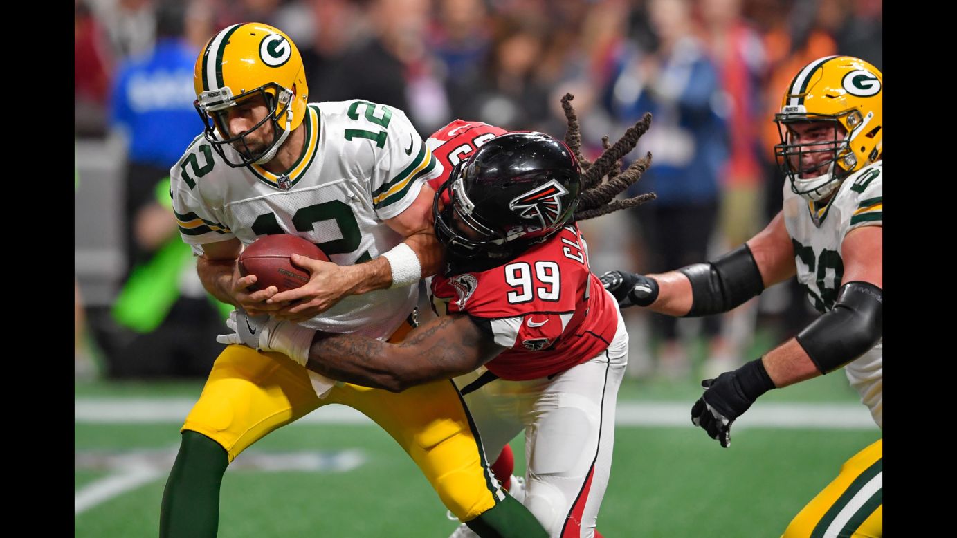 Green Bay quarterback Aaron Rodgers is sacked by Atlanta's Adrian Clayborn during an NFL game on Sunday, September 17. The Falcons sacked Rodgers three times and won 34-23 in what was a rematch of last year's NFC Championship. It was the first regular-season game played at Atlanta's new Mercedes-Benz Stadium.