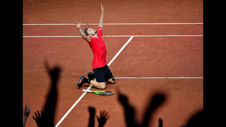 Belgium's David Goffin celebrates after winning his Davis Cup singles match against Australia's John Millman on Friday, September 15. Belgium went on to defeat the Australians 3-2 and clinch a spot in the final against France.
