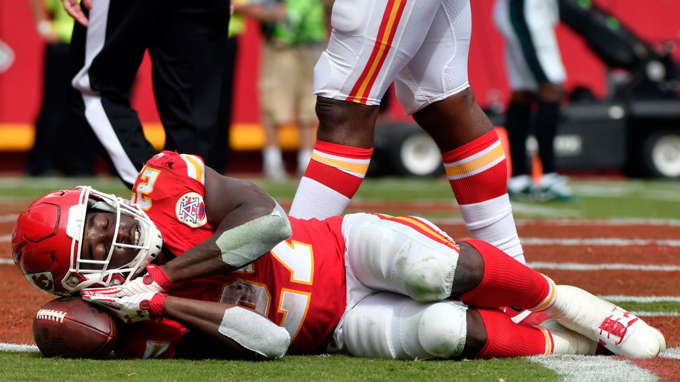 Kansas City running back Kareem Hunt pretends to sleep on the ball after scoring a touchdown against Philadelphia on Sunday, September 17. The NFL has relaxed its rules this year on touchdown celebrations.