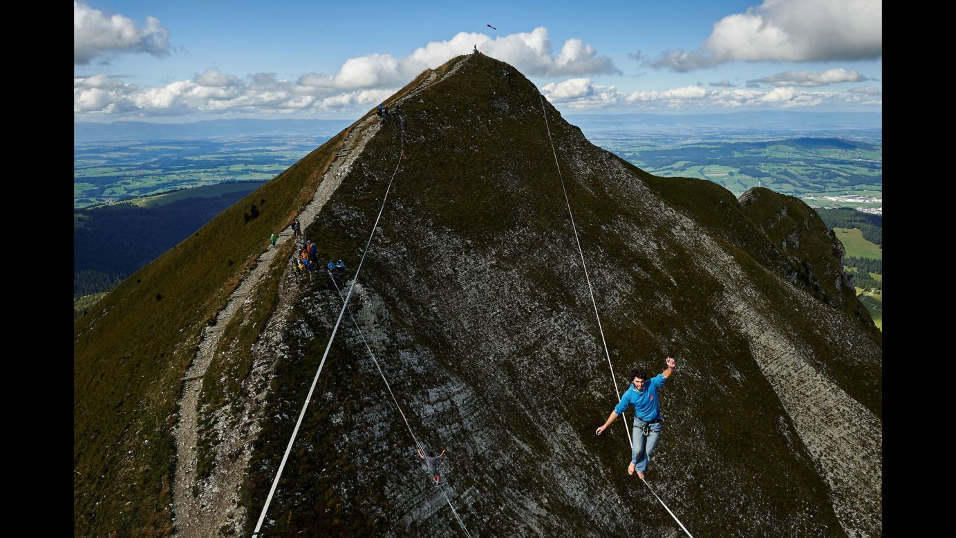 Daniel Laruelle, a slackliner from South Africa, balances near Switzerland's Moleson peak as he competes in the Highline Extreme event on Friday, September 15.