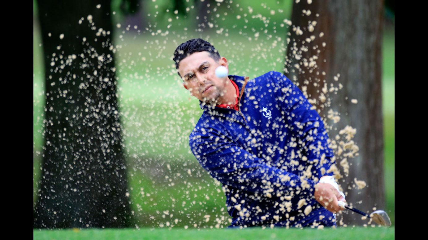 Rich Berberian Jr. hits a shot out of the bunker during the PGA Cup, an international team competition in Ottershaw, England, on Sunday, September 17. Berberian won his singles match, but the US team still lost to the team from Great Britain and Ireland.