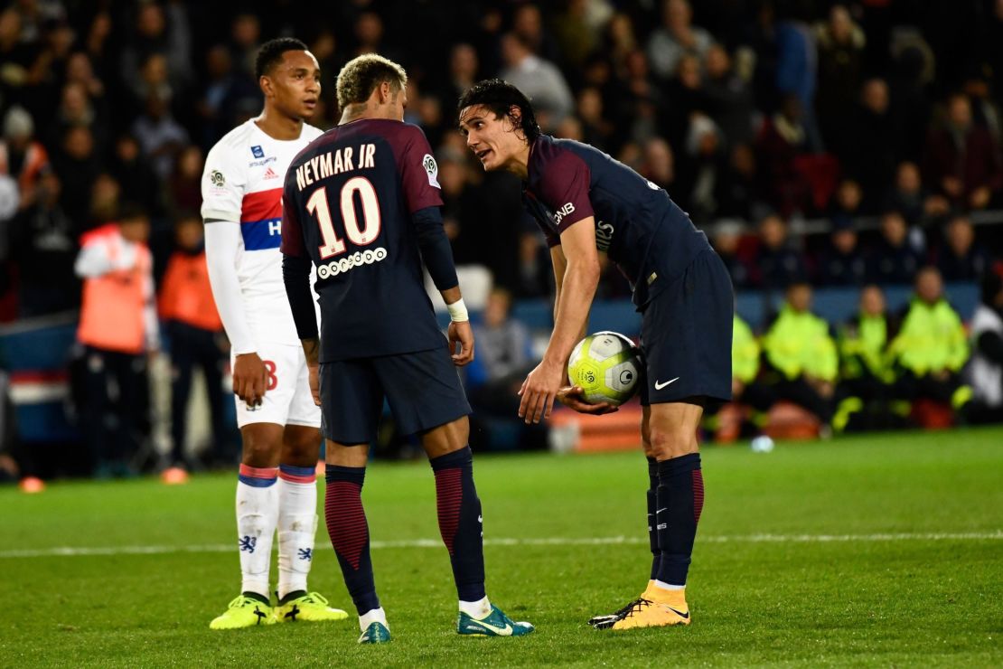Neymar and Edinson Cavani argue over penalty during the Ligue 1 match against Lyon.  (Christophe Simon - AFP/Getty Images)