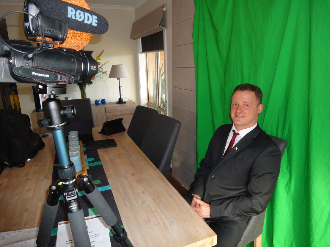 Chris Shortis films videos against a green screen in his home outside Melbourne that he posts to the internet.