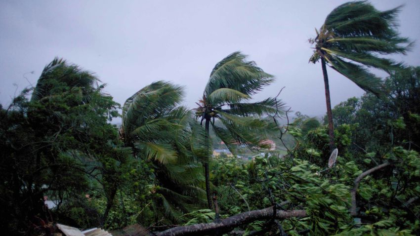 A picture taken on September 19, 2017 shows the powerful winds and rains of hurricane Maria battering the city of Petit-Bourg on the French overseas Caribbean island of Guadeloupe.Hurricane Maria strengthened into a "potentially catastrophic" Category Five storm as it barrelled into eastern Caribbean islands still reeling from Irma, forcing residents to evacuate in powerful winds and lashing rain. / AFP PHOTO / Cedrik-Isham Calvados /         (Photo credit should read CEDRIK-ISHAM CALVADOS/AFP/Getty Images)