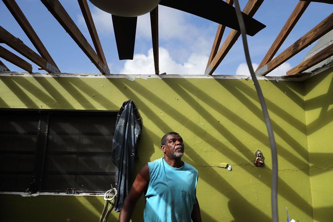 Carmelo Mota, a builder, searches for tools in his destroyed home in Charlotte Amalie, US Virgin Islands, on Monday, September 18. Hurricane Irma devastated the US territory and other Caribbean islands in the region, leaving them exposed to new storms brewing in the Atlantic.