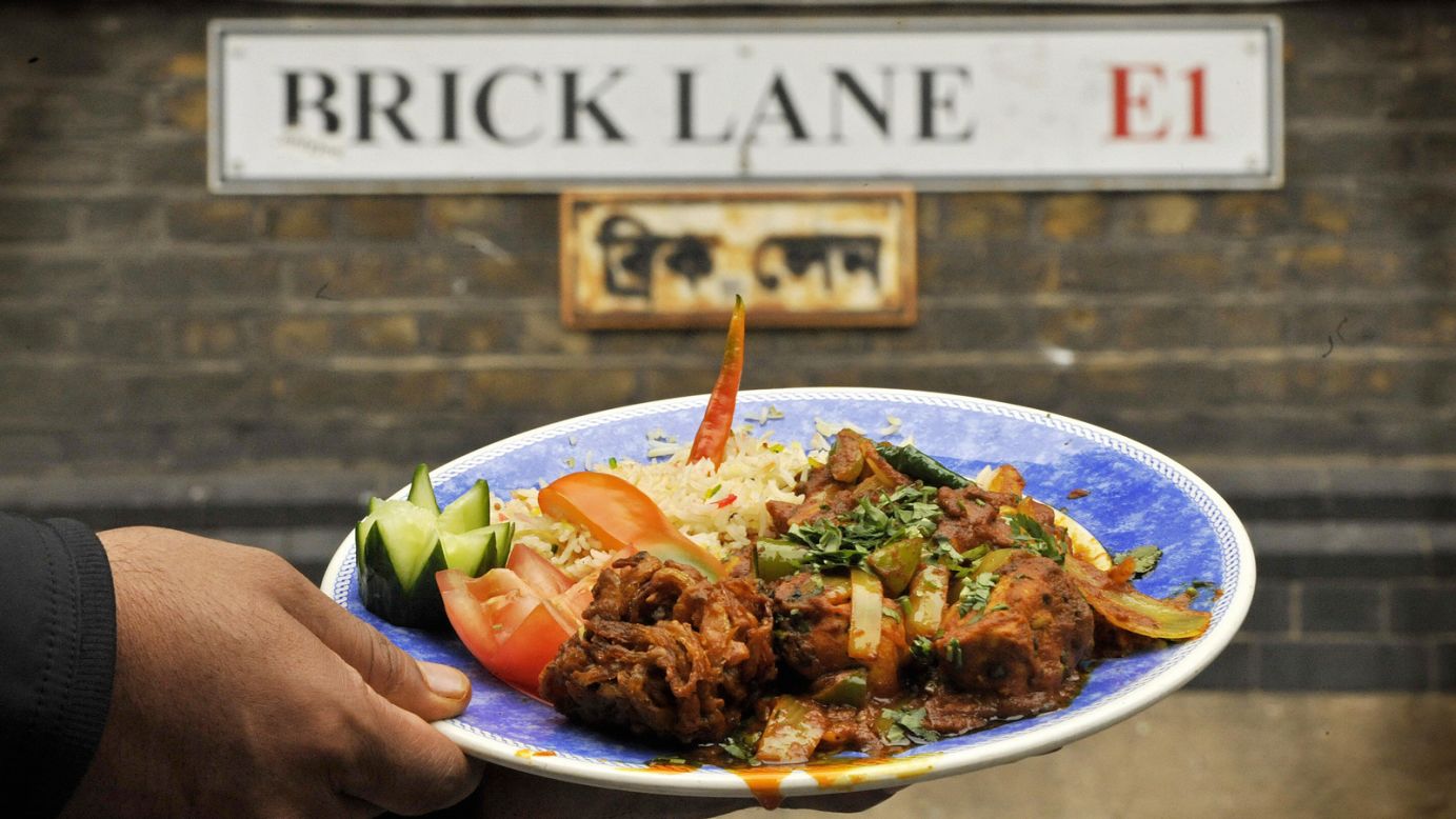 <strong>Brick Lane curry:</strong> Today, Brick Lane is famous for its curries. Dozens of restaurants line the busy thoroughfare. 