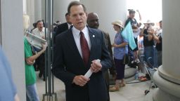 MONTGOMERY, AL ? AUGUST 21:  Alabama Supreme Court Chief Justice Roy Moore walks back into the state Judicial Building after addressing supporters August 21, 2003 in Montgomery, Alabama.