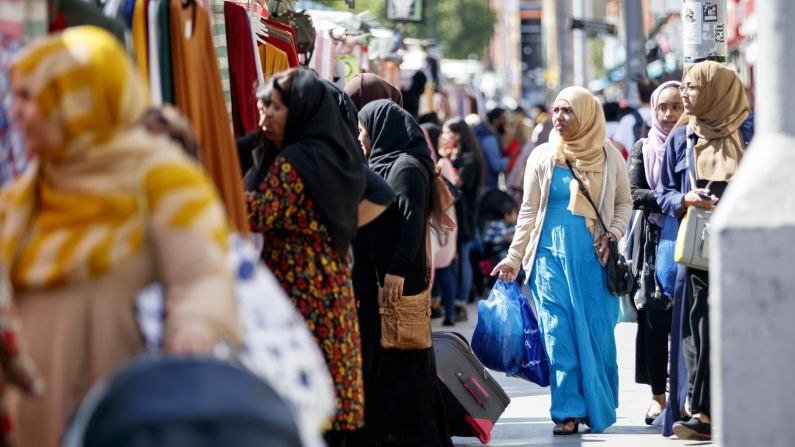 <strong>London's East End: </strong>David Rosenberg's East End Walk tours focus on the waves of immigrants who have made the East End their home. Pictured: Shoppers at Whitechapel Market in August 2017. 