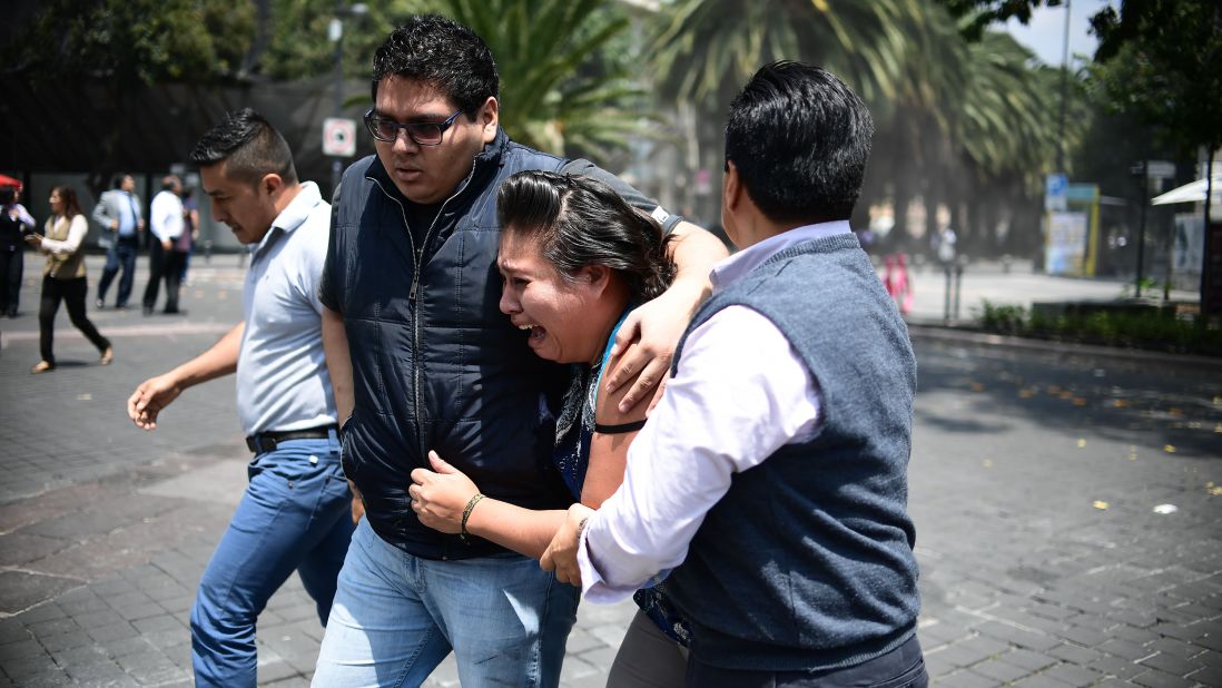 People react in Mexico City just after the quake hit.