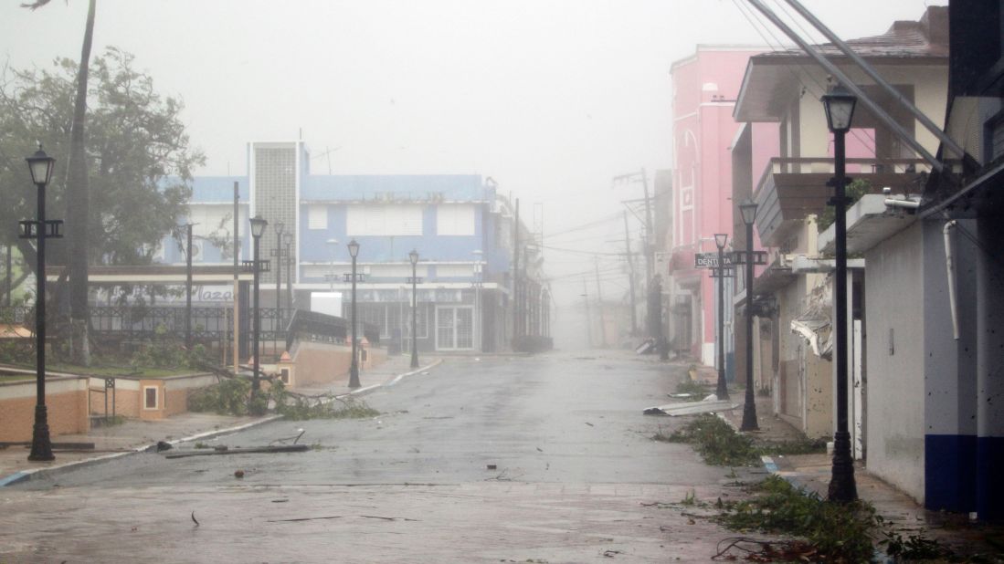 Debris is strewn across a Fajardo street on September 20. 