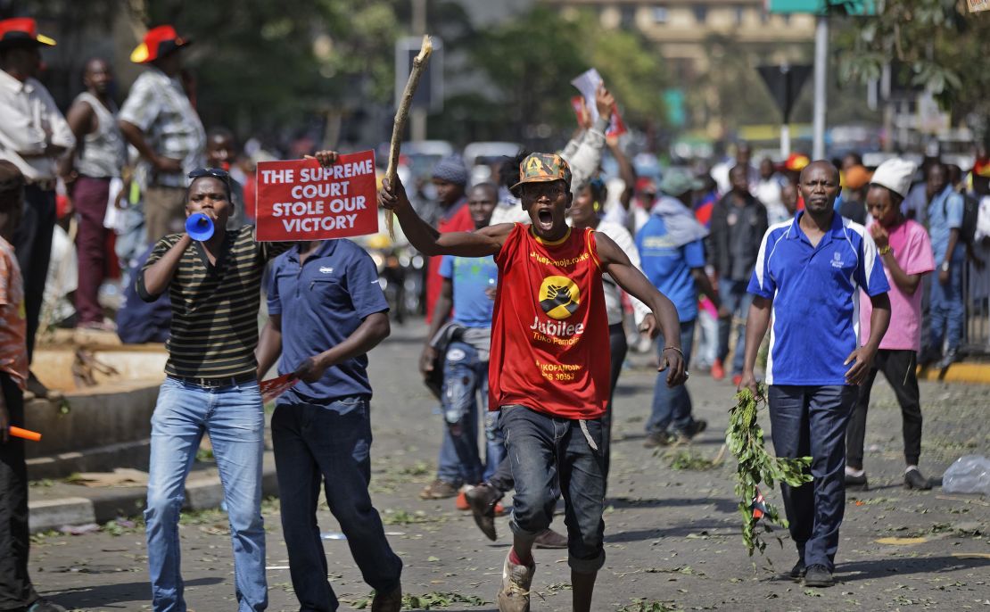 Supporters of President Uhuru Kenyatta, angry at the Supreme Court's nullification of the August presidential election, protest outside the court in downtown Nairobi on Tuesday.