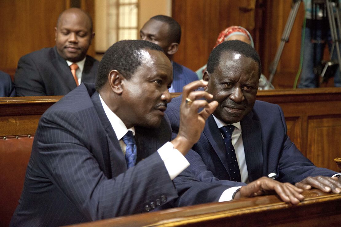 Kenyan opposition presidential candidate, Raila Odinga, right, with his running mate Kalonzo Musyoka, left, attends the Kenyan Supreme Court to hear the detailed ruling concerning the August presidential elections, on Wednesday, September 20.