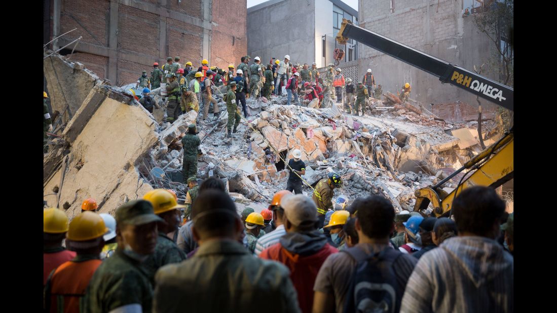 People look for survivors in Mexico City on September 20.