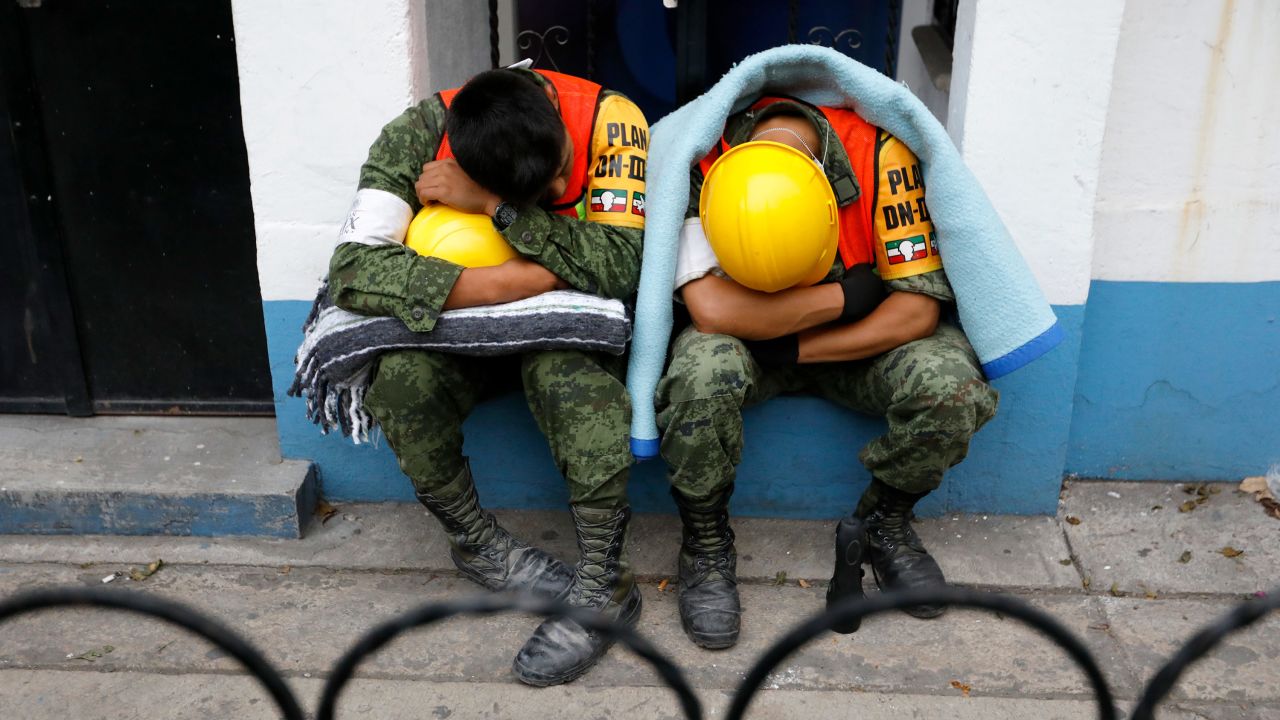 Members of the Mexican Army nap September 20 after assisting in search-and-rescue missions in Mexico City.