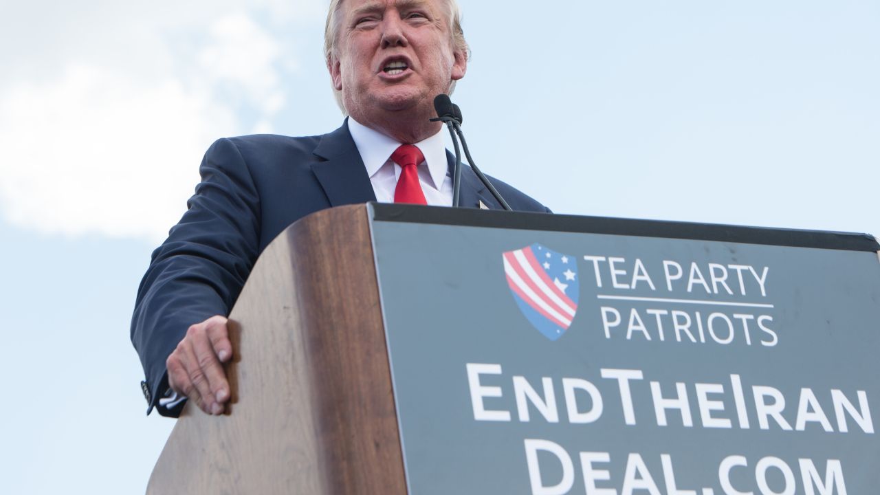 US Republican presidential candidate Donald Trump speaks at a rally organized by the Tea Party Patriots against the Iran nuclear deal in front of the Capitol in Washington, DC, on September 9, 2015.  AFP PHOTO/NICHOLAS KAMM        (Photo credit should read NICHOLAS KAMM/AFP/Getty Images)