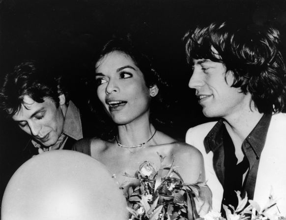 Dancer Mikhail Baryshnikov with Bianca and Mick Jagger at Bianca's 1977 birthday party. 